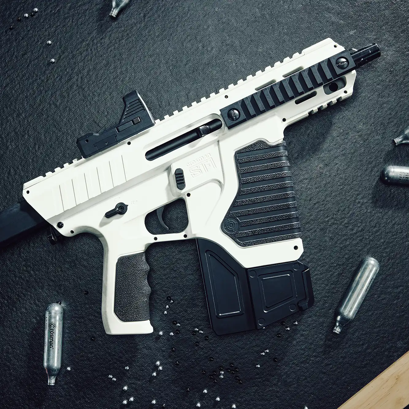 Crosman Full Auto ST-1 (BB) CFAST1X Indoor Lifestyle Sitting on a Bench