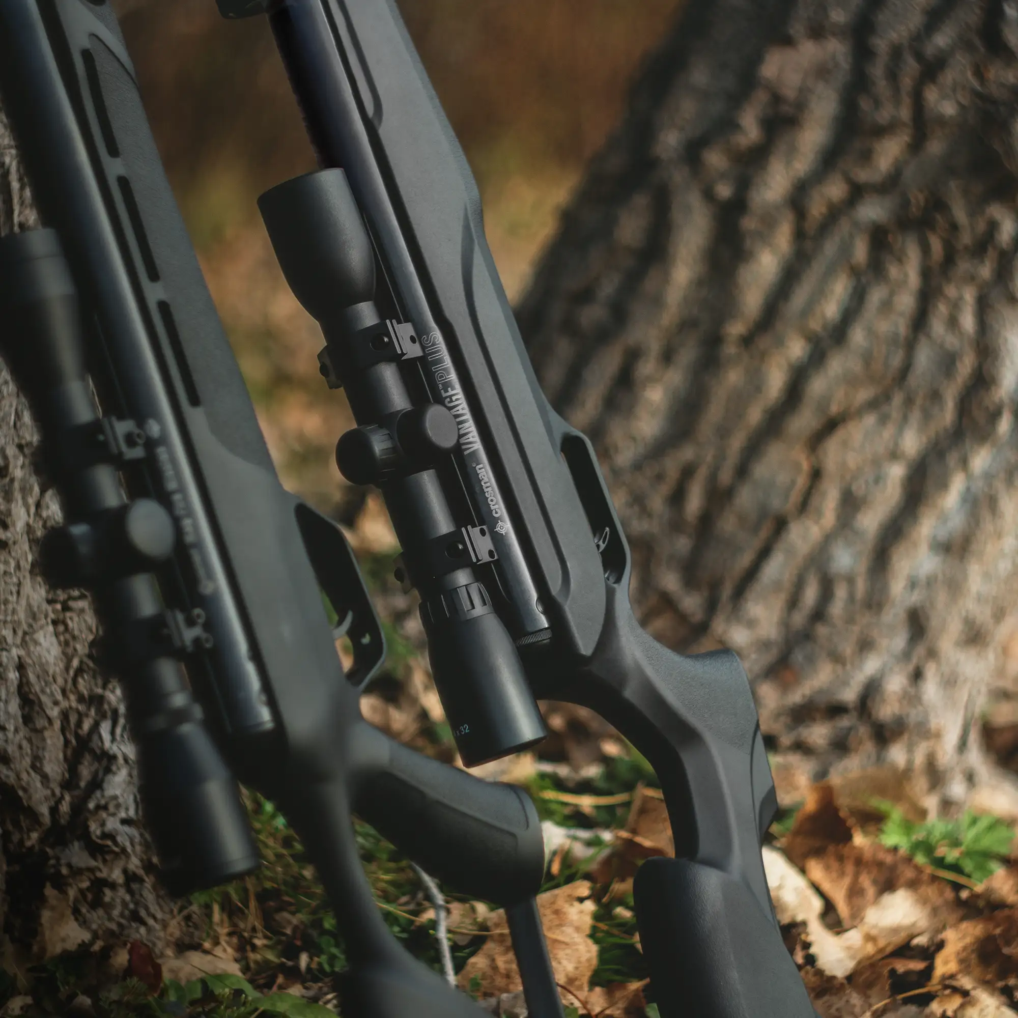 Crosman Vantage Plus Break Barrel in .22 Cal CVANP2X Outdoor Lifestyle Leaning on a Tree