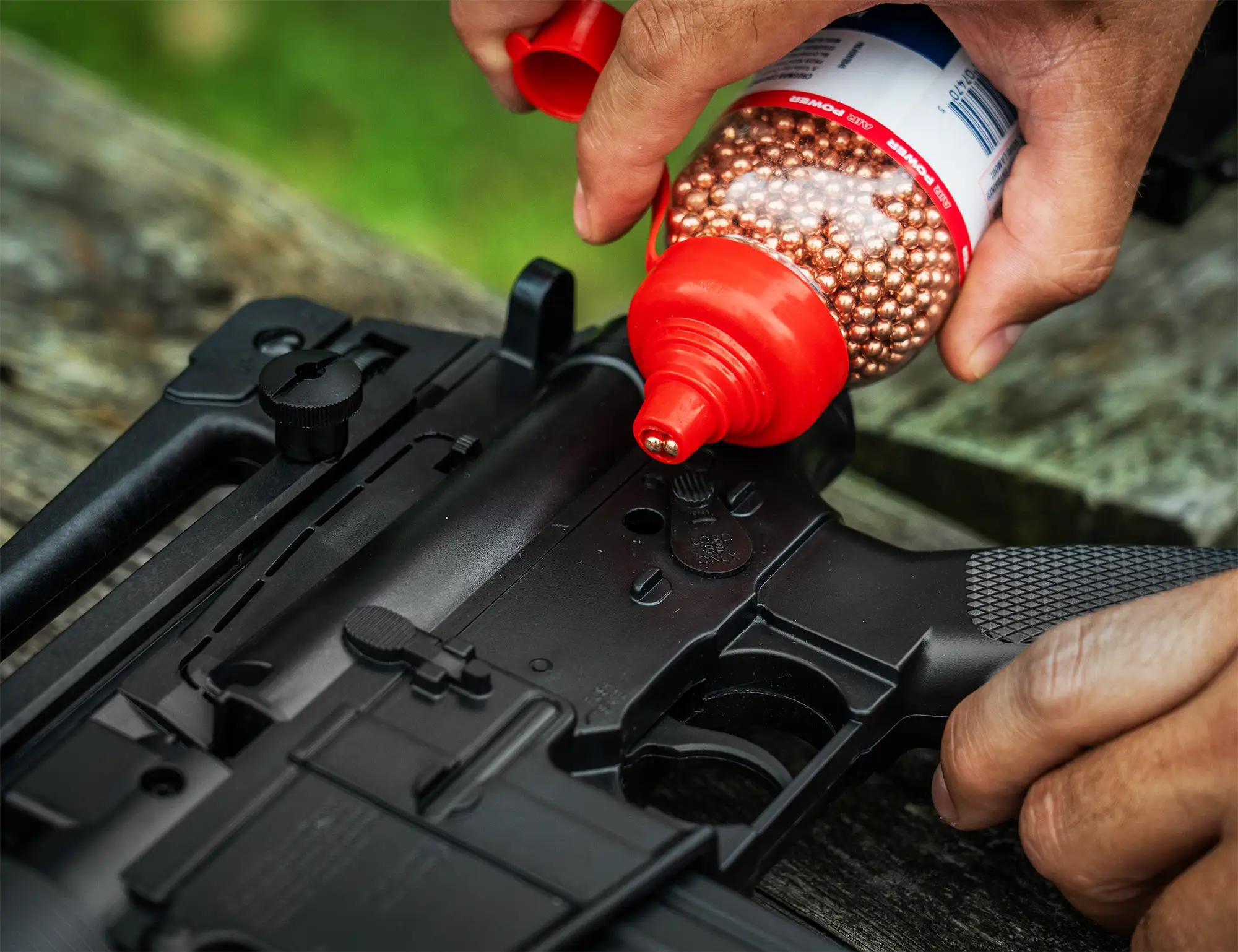 Crosman M4-177 .177 Pellet / BB Pneumatic Pump Air Rifle M4-177KT-N Outdoor Lifestyle BBs Being Loaded