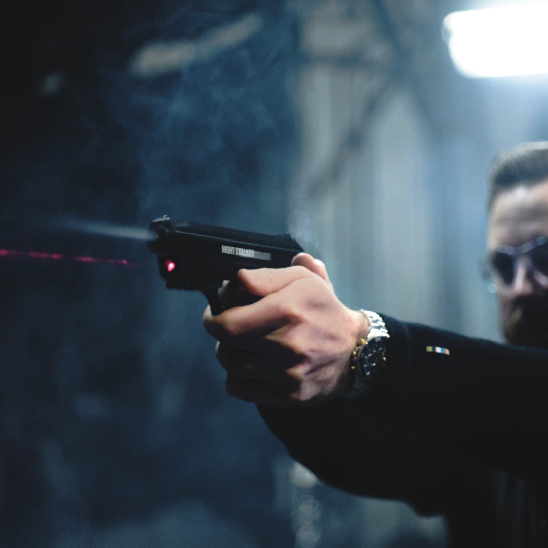 Crosman Night Stalker BB Pistol PFM520 Indoor Lifestyle Sitting on an Industrial Surface