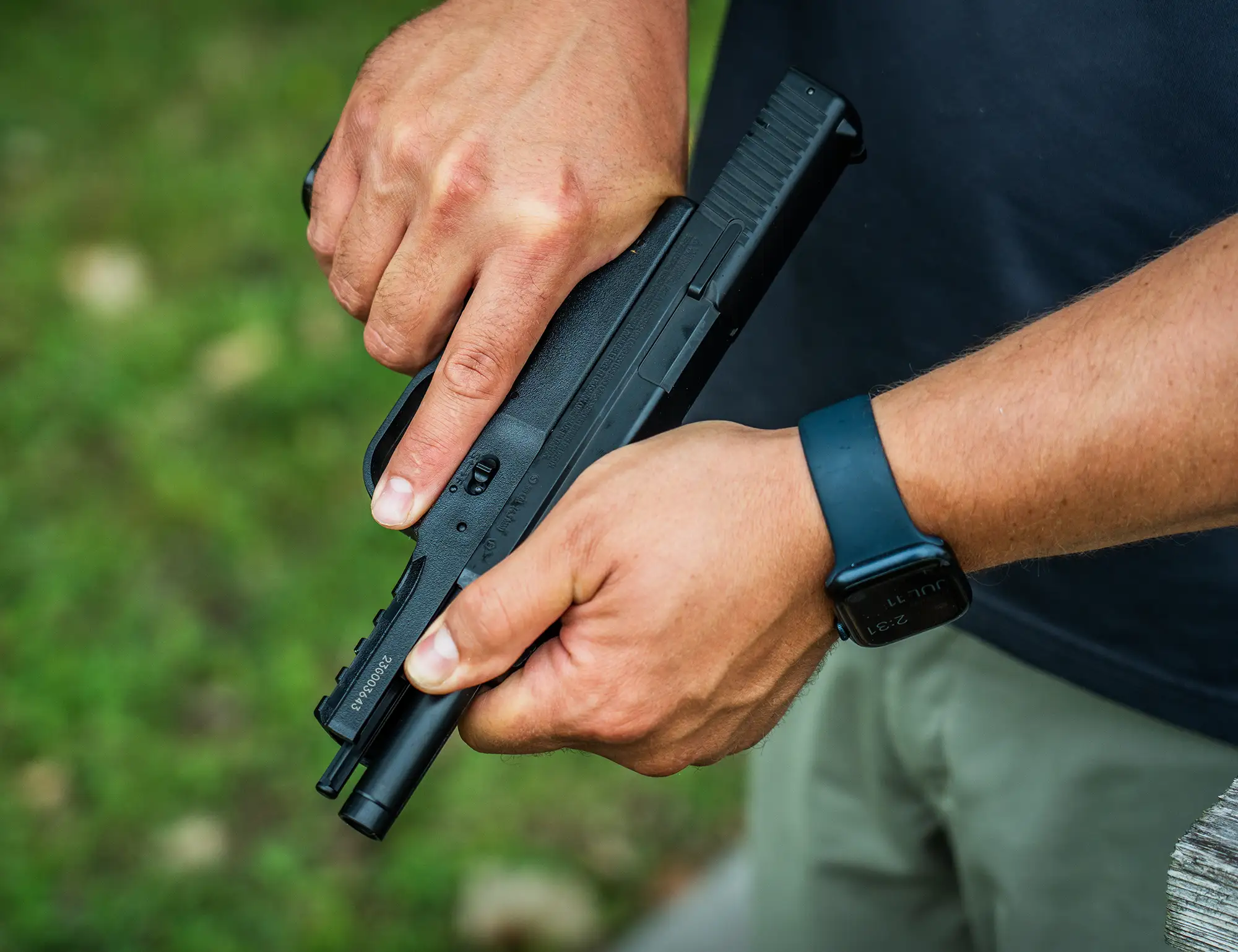 Crosman PSM45 BB Pistol Outdoor Lifestyle Being Cocked