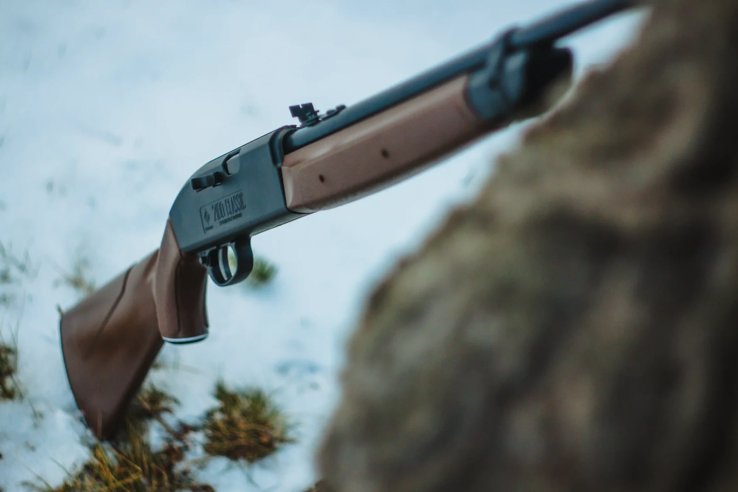 2100 Leaning Against a Tree Outdoors during Winter Medium